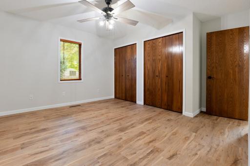 Primary bedroom - don't miss the custom storage in the closets!