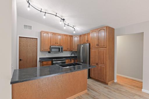 Updated kitchen with pull out pantry shelves