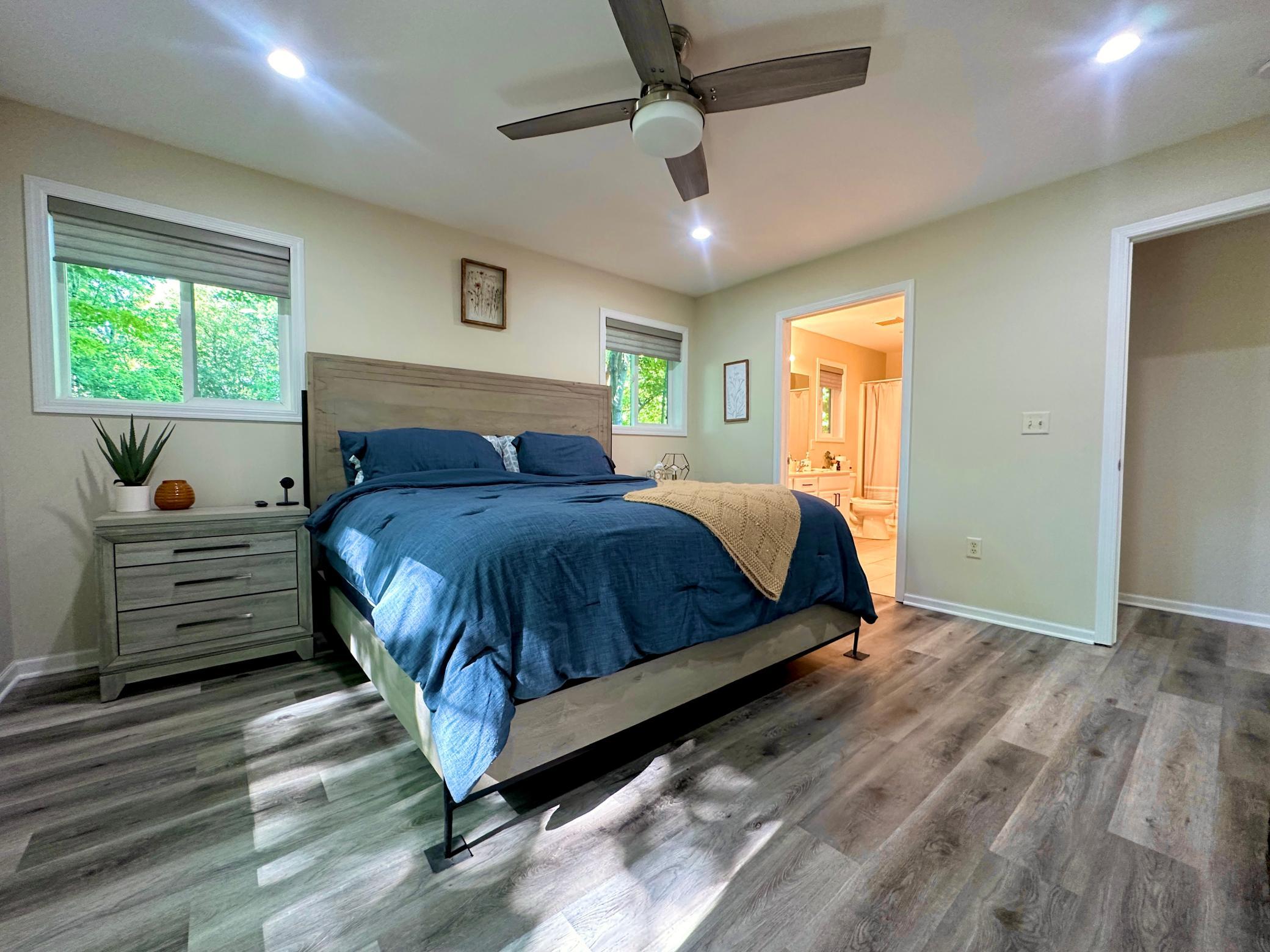 Windows have blinds and this great room has a private bath and large walk in closet.