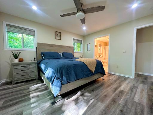 Windows have blinds and this great room has a private bath and large walk in closet.