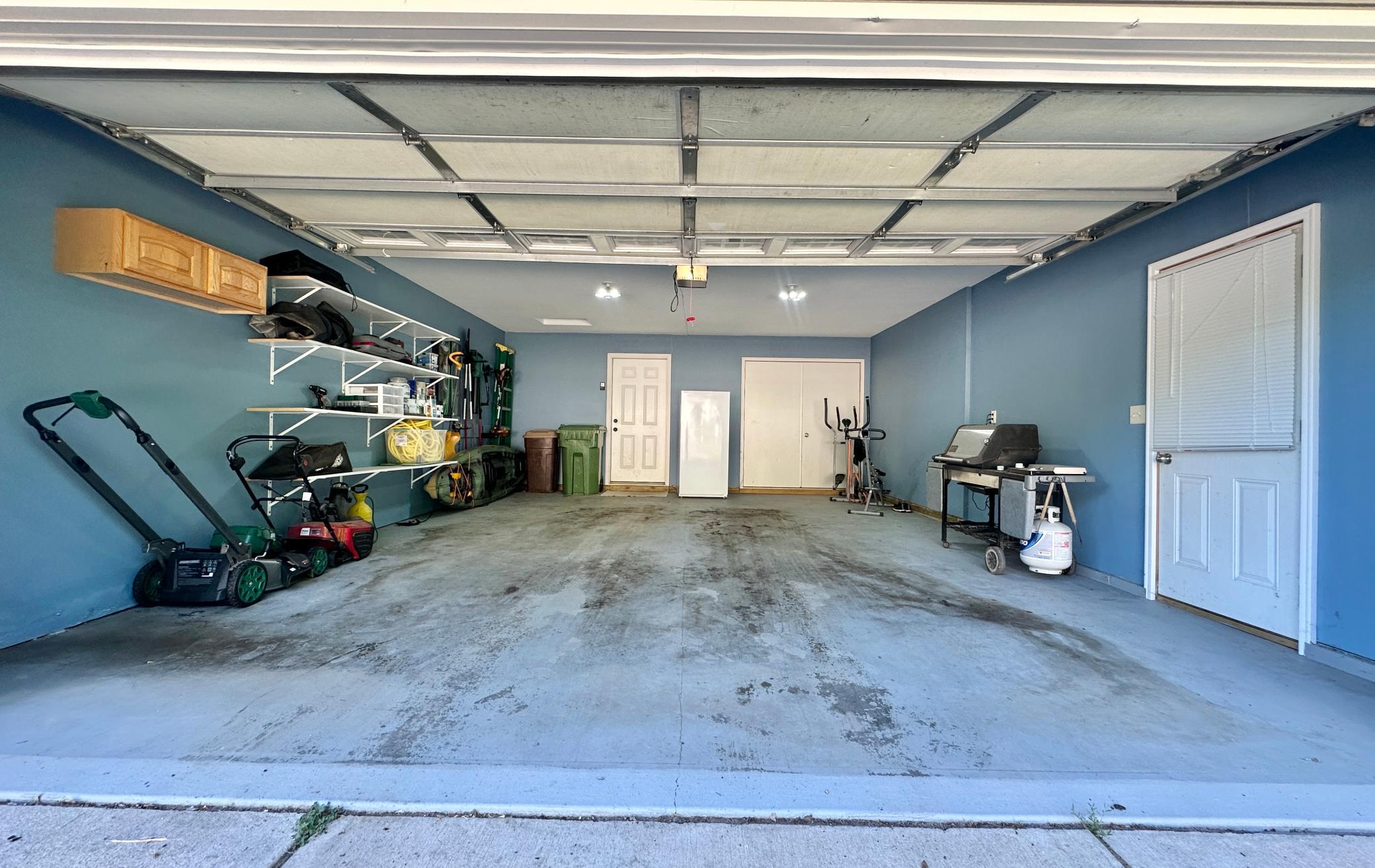 The garage is clean and organized with good space. The double closet in the back houses the homes mechanicals. Don't wait on this one, you will regret it!