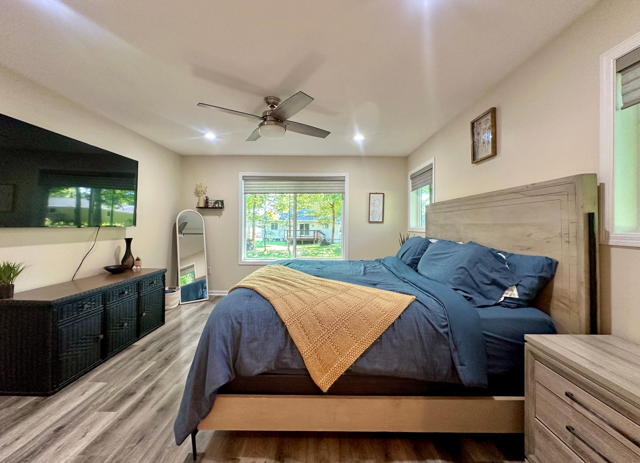 LED lighting and ceiling fan complete this room or maybe the abundance of natural light does.
