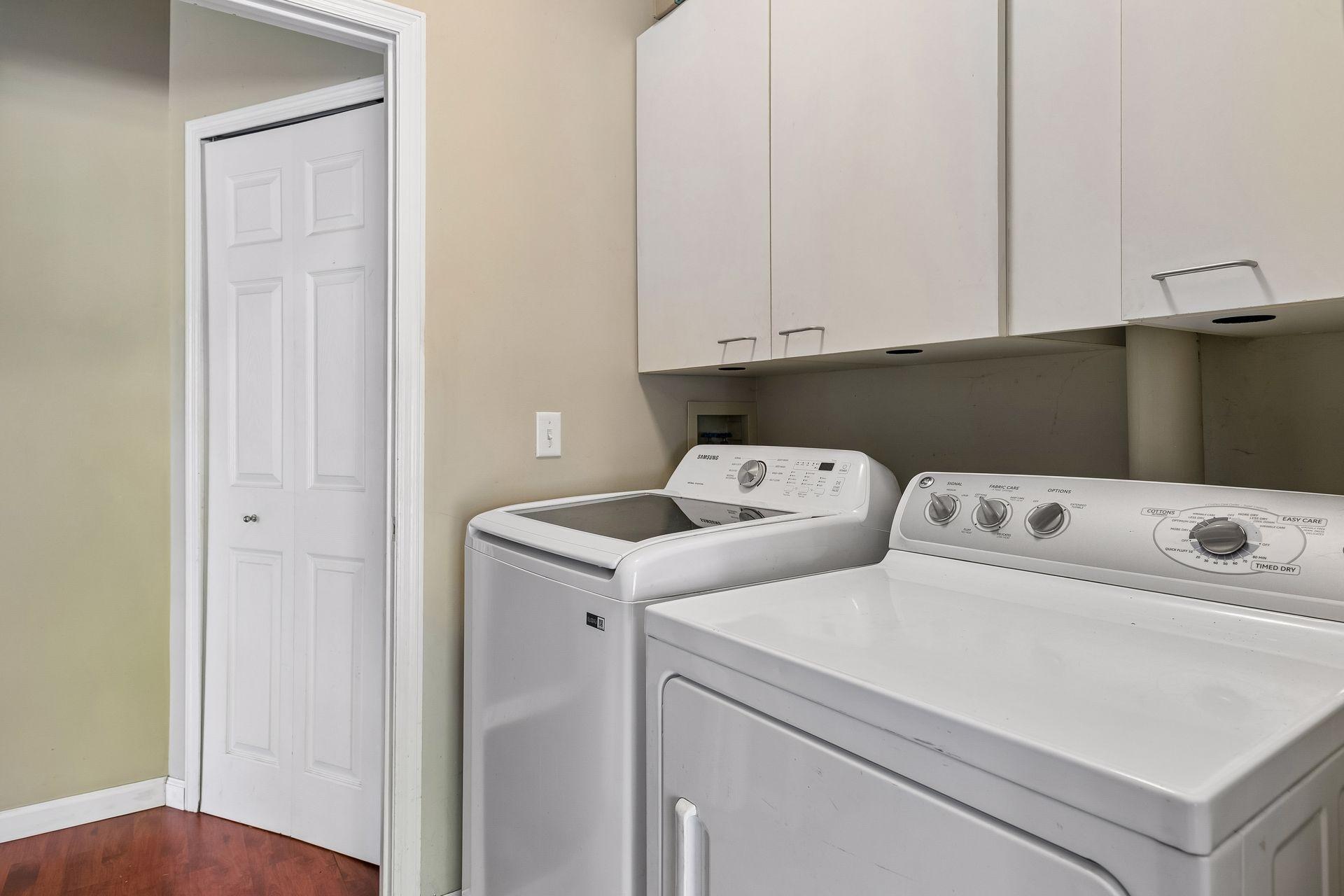 Laundry is on the main level off the garage entrance.
