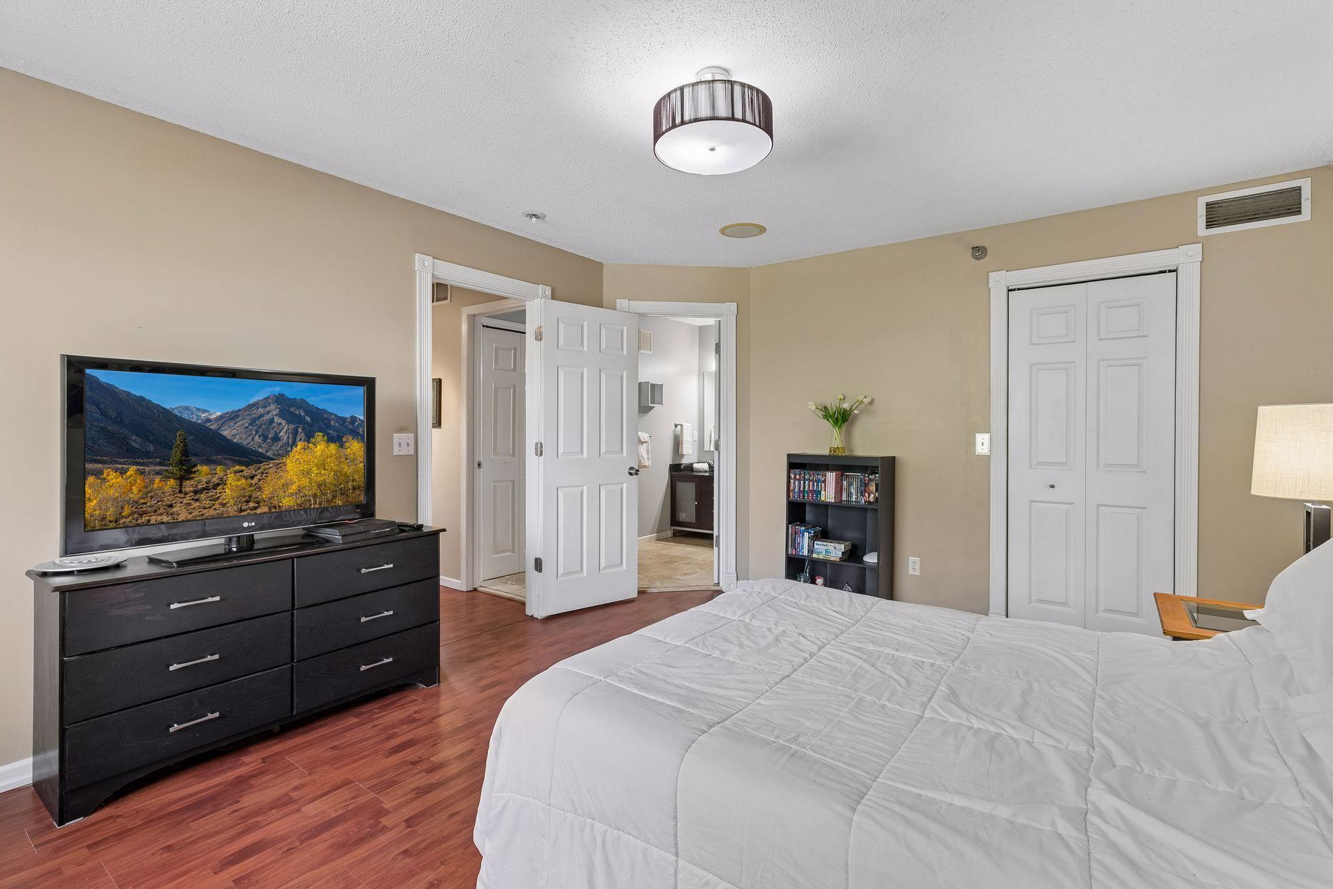 Primary Bedroom is connected to the walk-through bathroom.