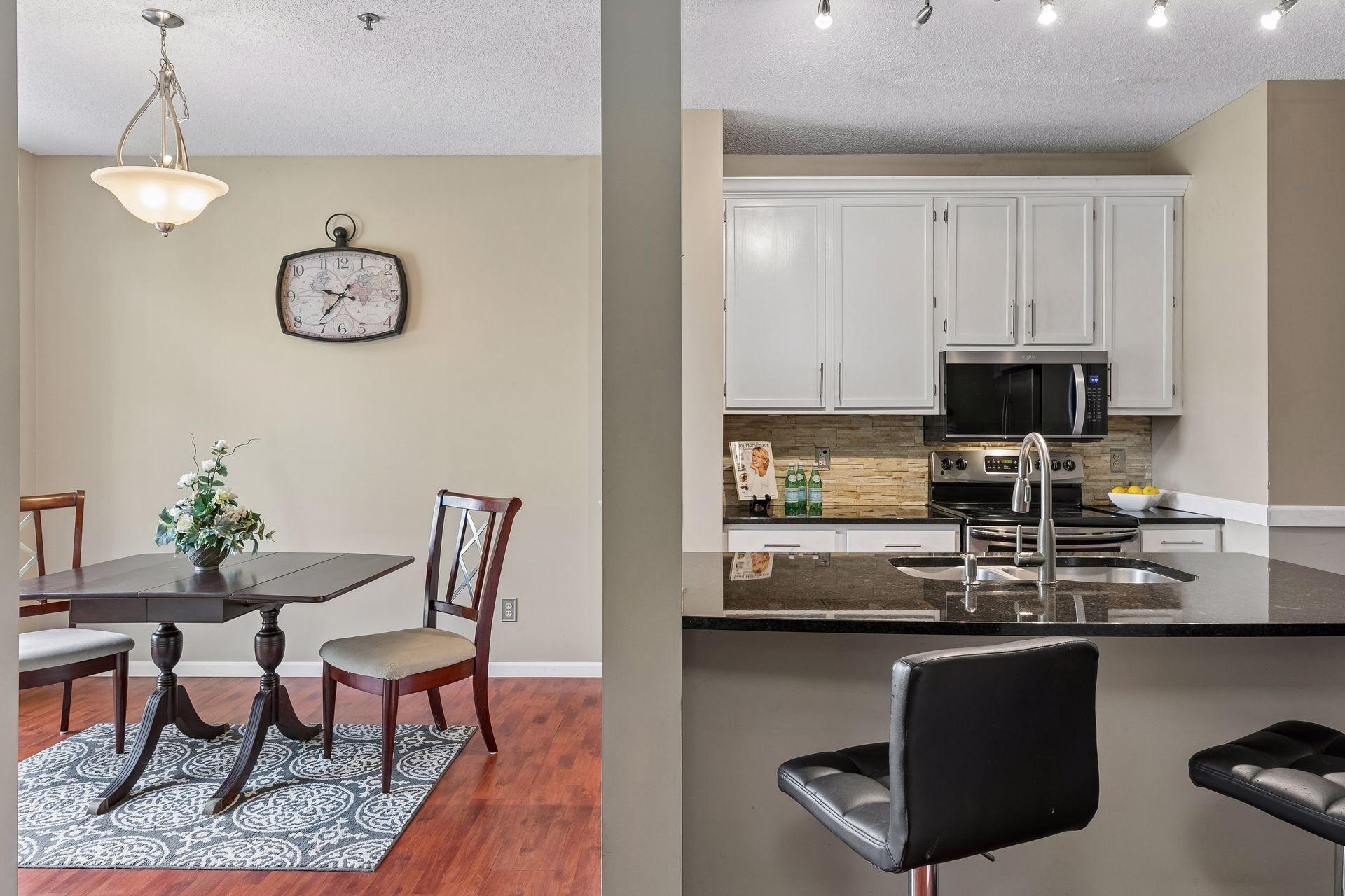 Dining area is adjacent to kitchen.