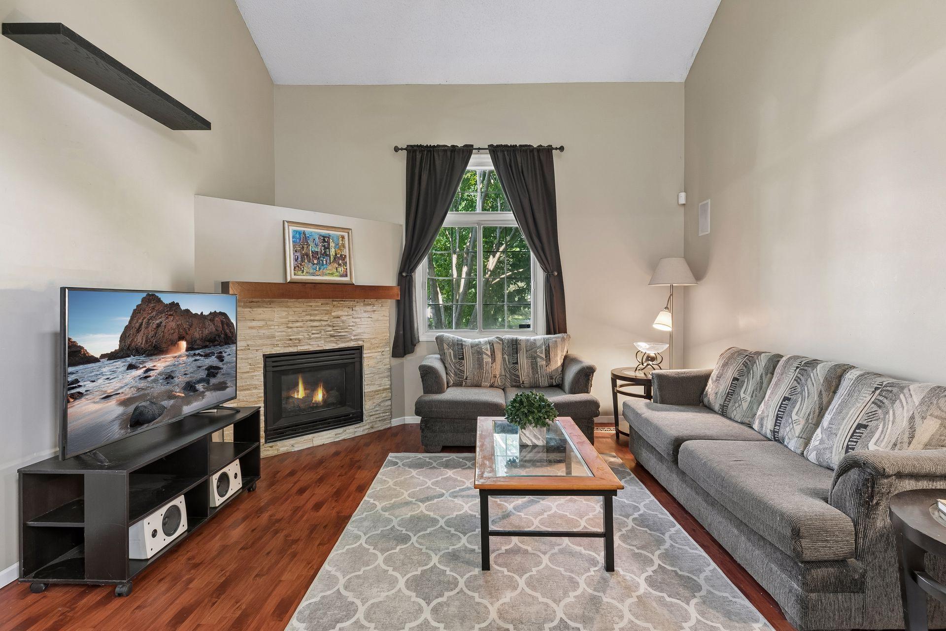 Enjoy the stone surround on the gas fireplace.
