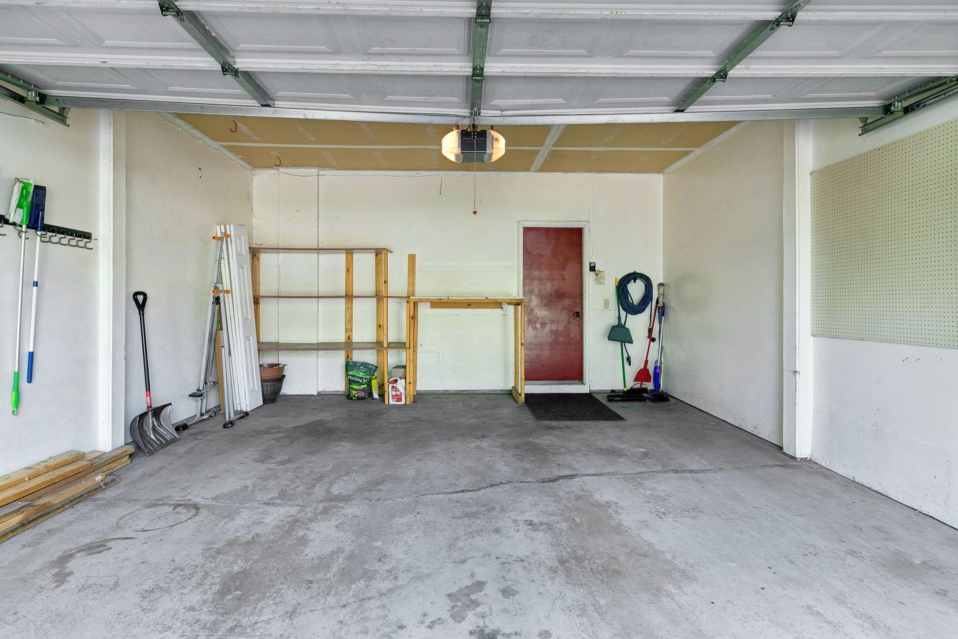 2-Car Garage with shelving.