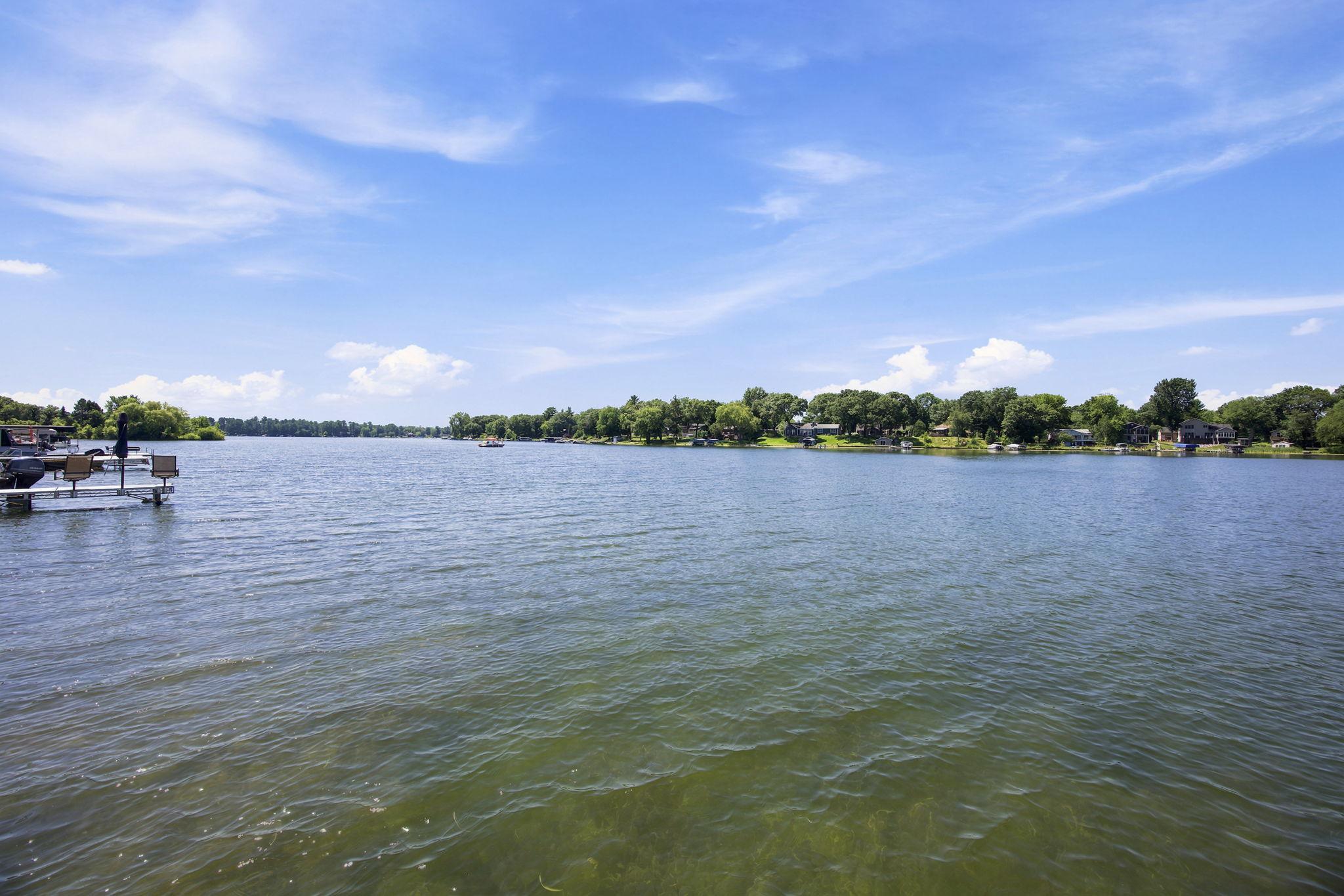Open water views stretch across the backyard