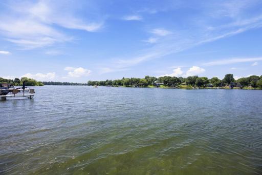 Open water views stretch across the backyard