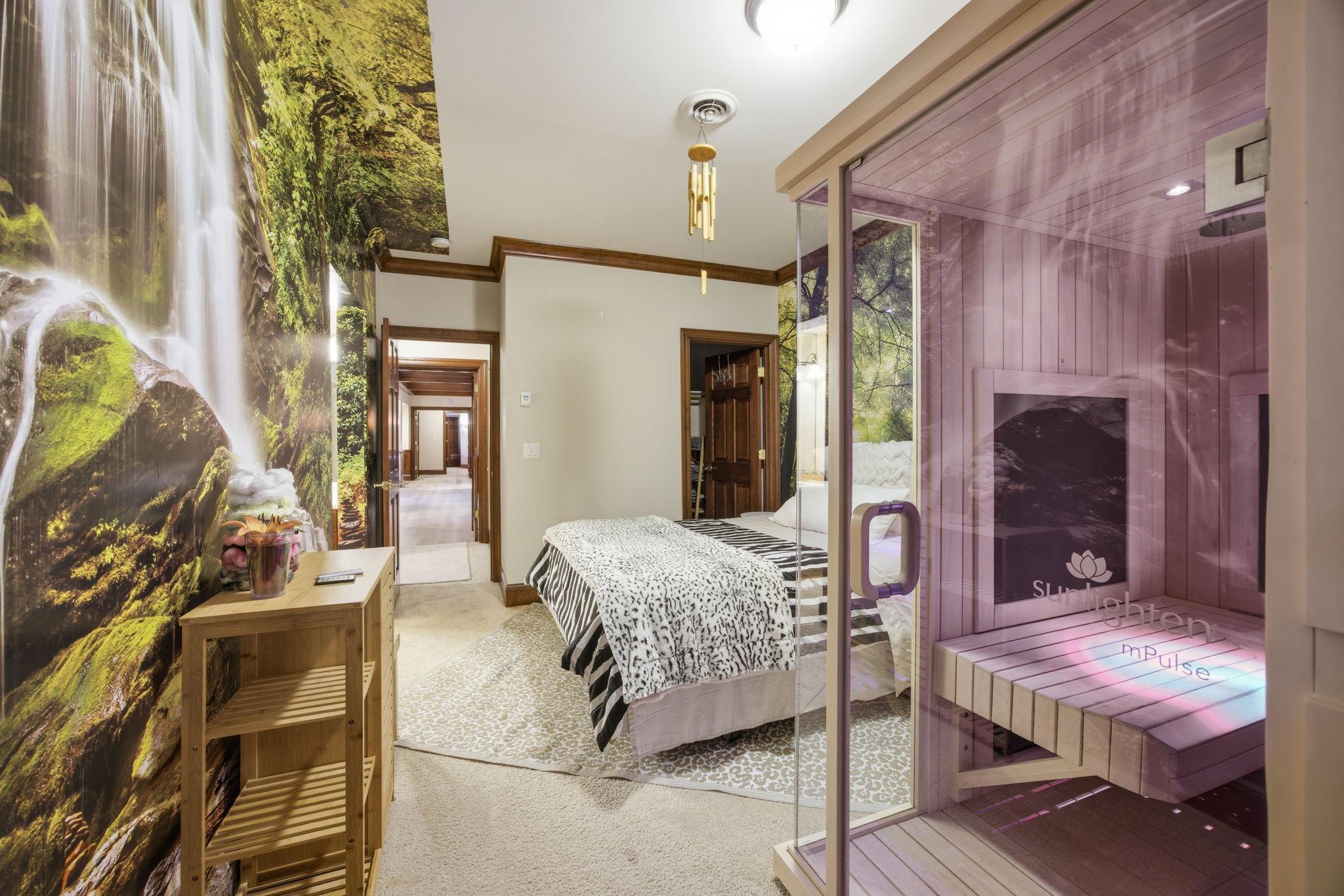 Lower level bedroom 2 also includes an ensuite bath