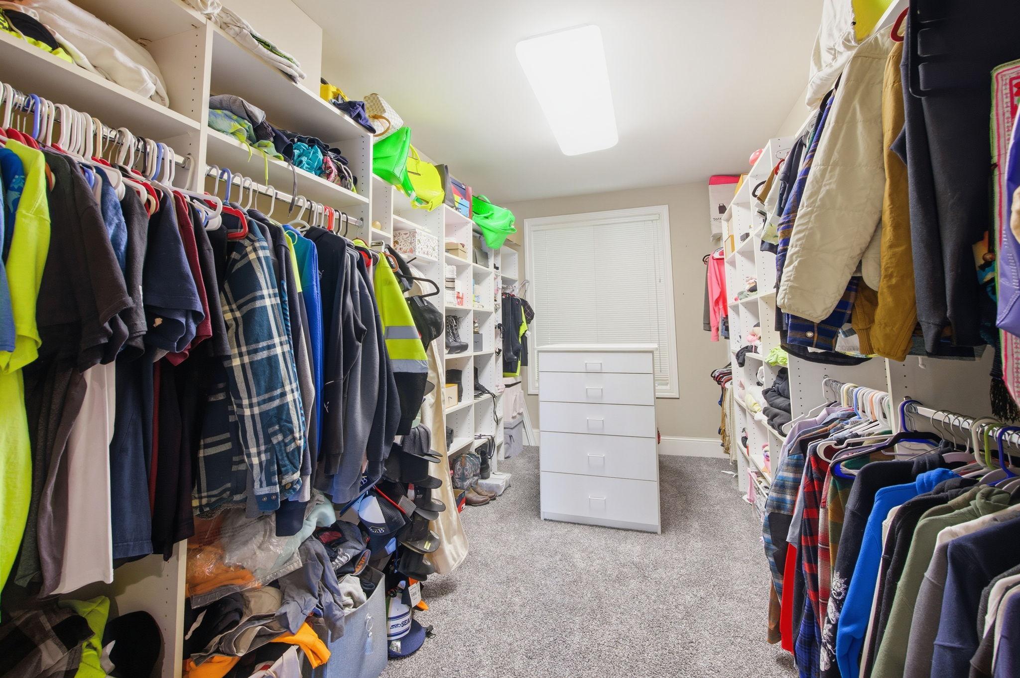 Spacious primary walk-in closet