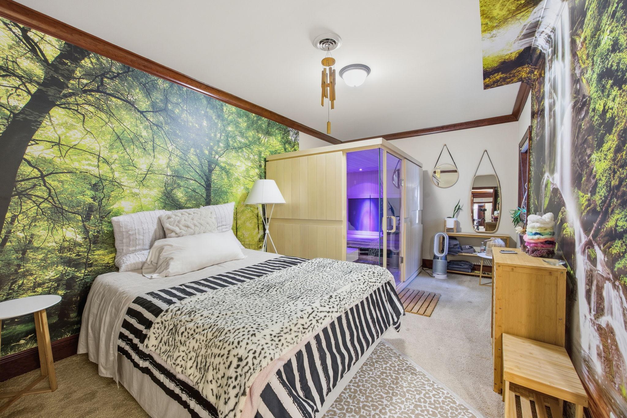 A private sauna creates a dedicated wellness retreat just steps from a comfortable guest space i n lower level bedroom 2