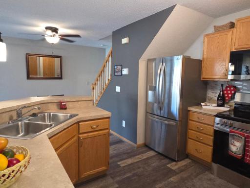 Newer stainless steel appliances and LVT flooring