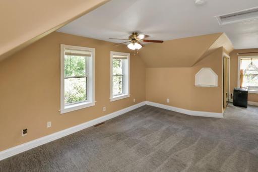 Huge primary bedroom upstairs- 2 areas plus a sitting area.jpg