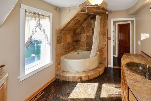 Custom floors and tiled counterop and shower surround.jpg