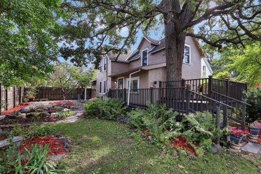 Extensive landscaping throughout the fenced yard.jpg