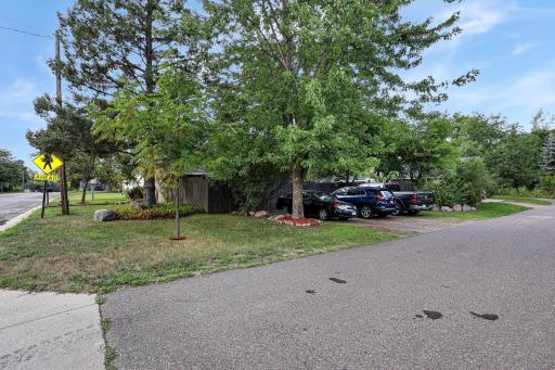 Three additional parking spaces off the alley, before the garage access just beyond.jpg