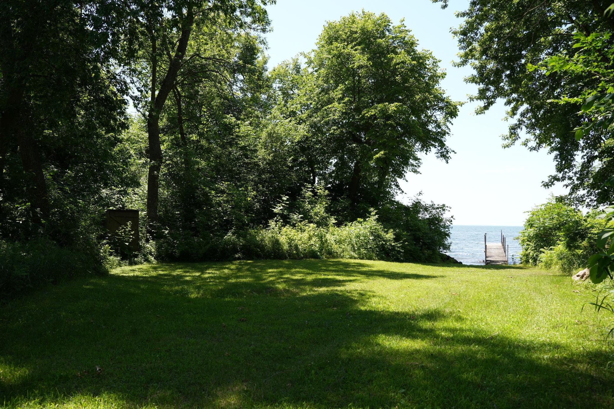 Backyard view to the dock and Mille Lacs Lake.JPG