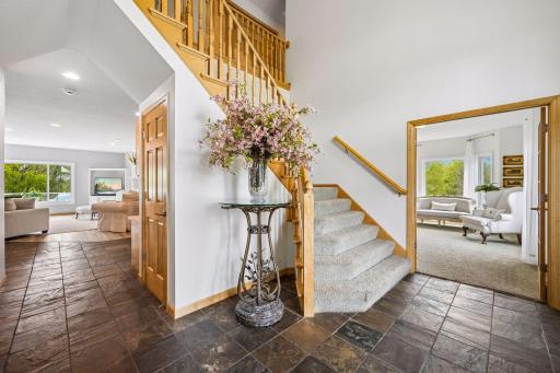 Be greeted by this fabulous two story entryway