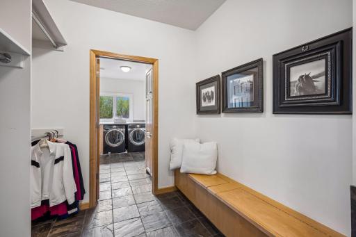 Mudroom off the garage with extra bench storage