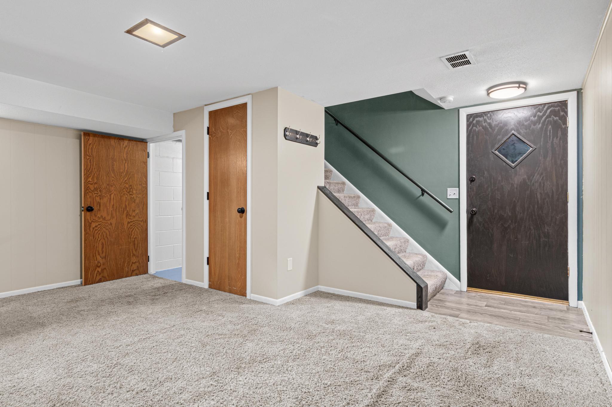 Stairs from upstairs and into garage