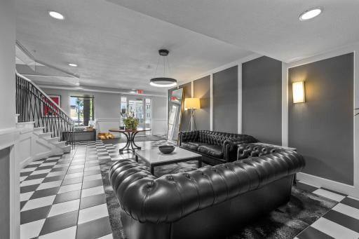 Sophisticated shared lounge space near the building's entry