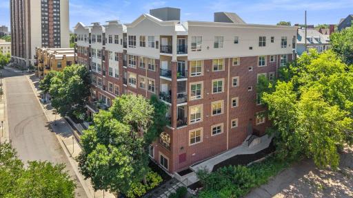 Aerial view of the boutique brick building, steps from Loring Park and the Greenway