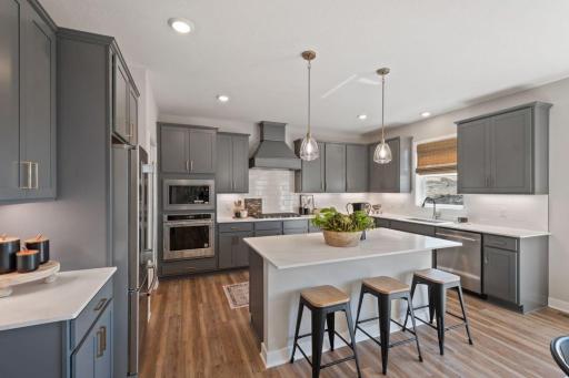 Enough room for the whole family or to entertain. Photo of model home, colors and finishes may vary.