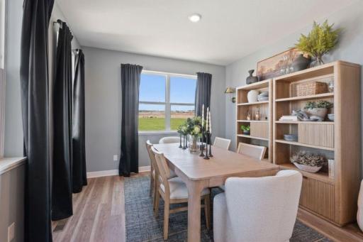 You will appreciate this versatile flex room at the front of the home. It can be used as a formal dining room, a playroom or maybe an office. Photo of model, colors and finishes may vary.