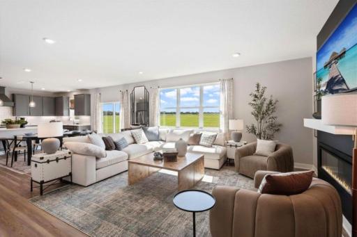 In this reverse view you can see how the main level flows naturally from room to room. Photo of model home, colors and finishes may vary.