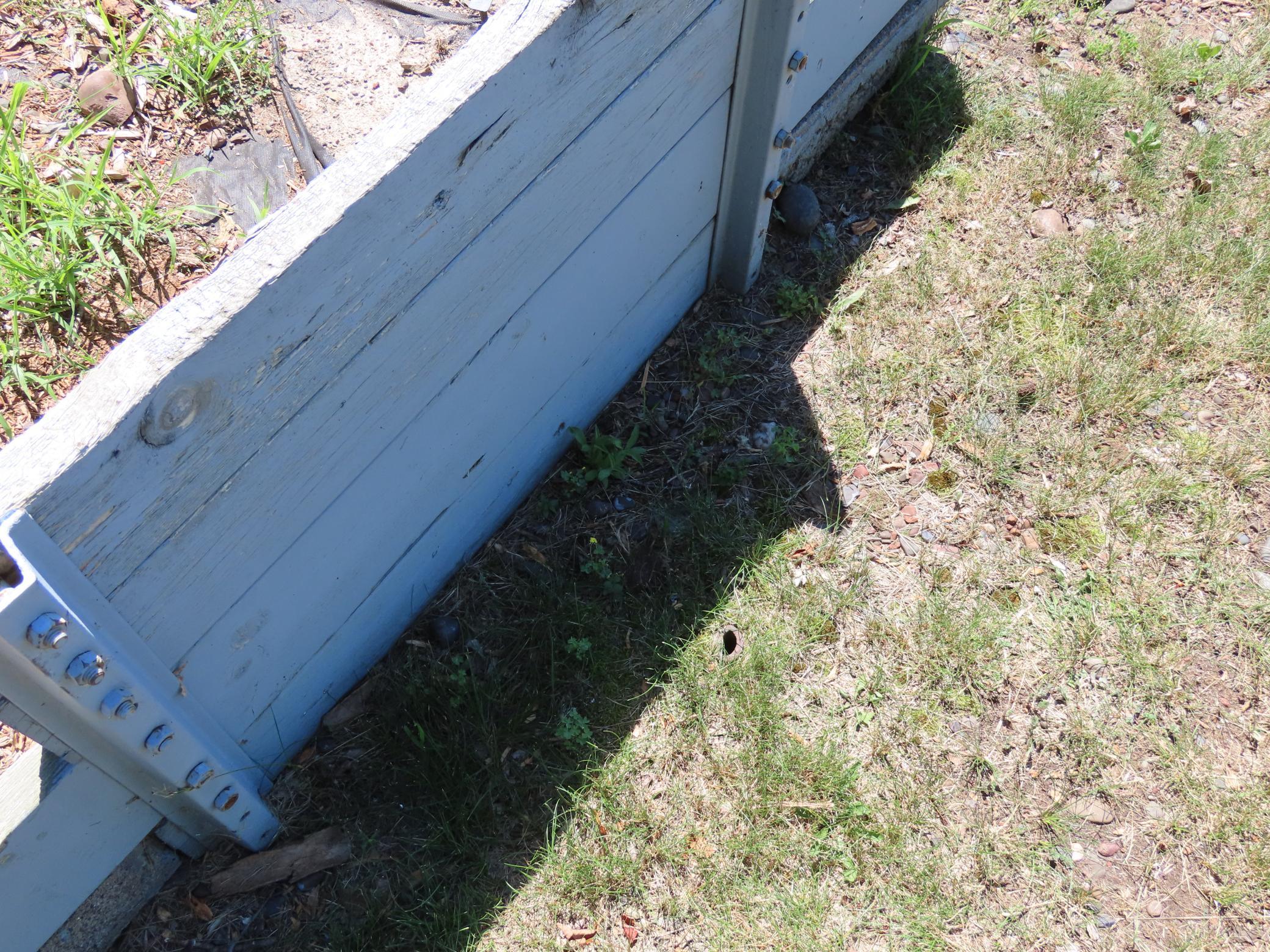 Northwest corner post next to the pit.