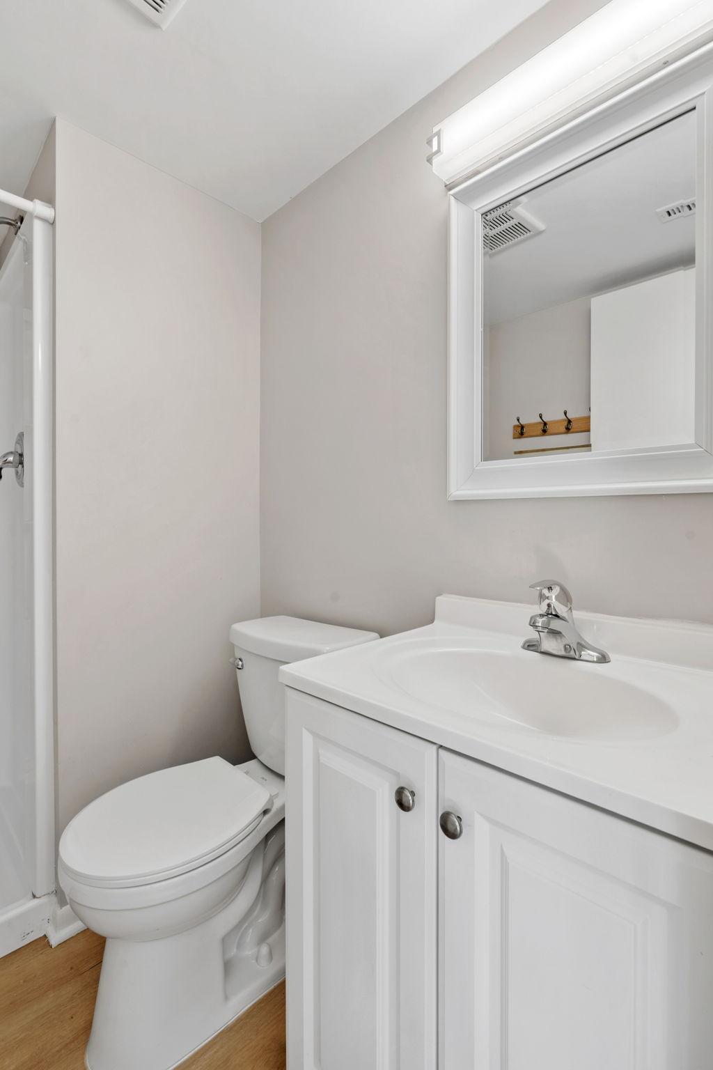 Additional view of the half bathroom.