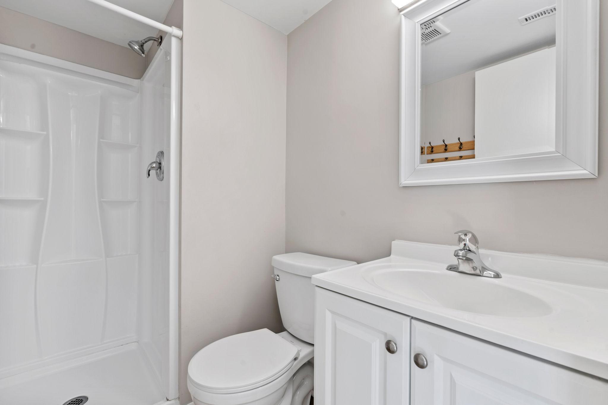 Half bathroom with vanity.