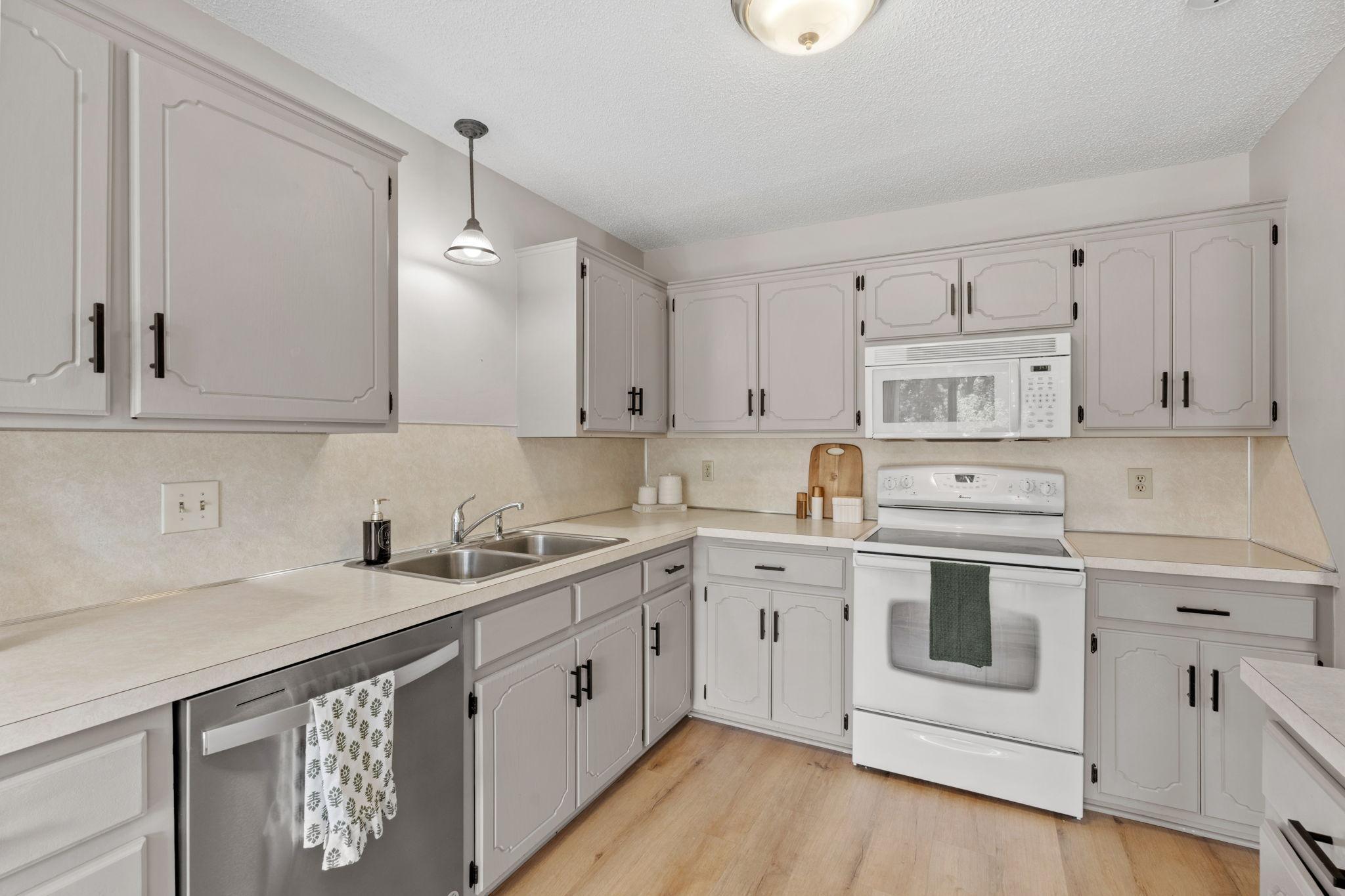 Kitchen with ample cabinet and counter space.