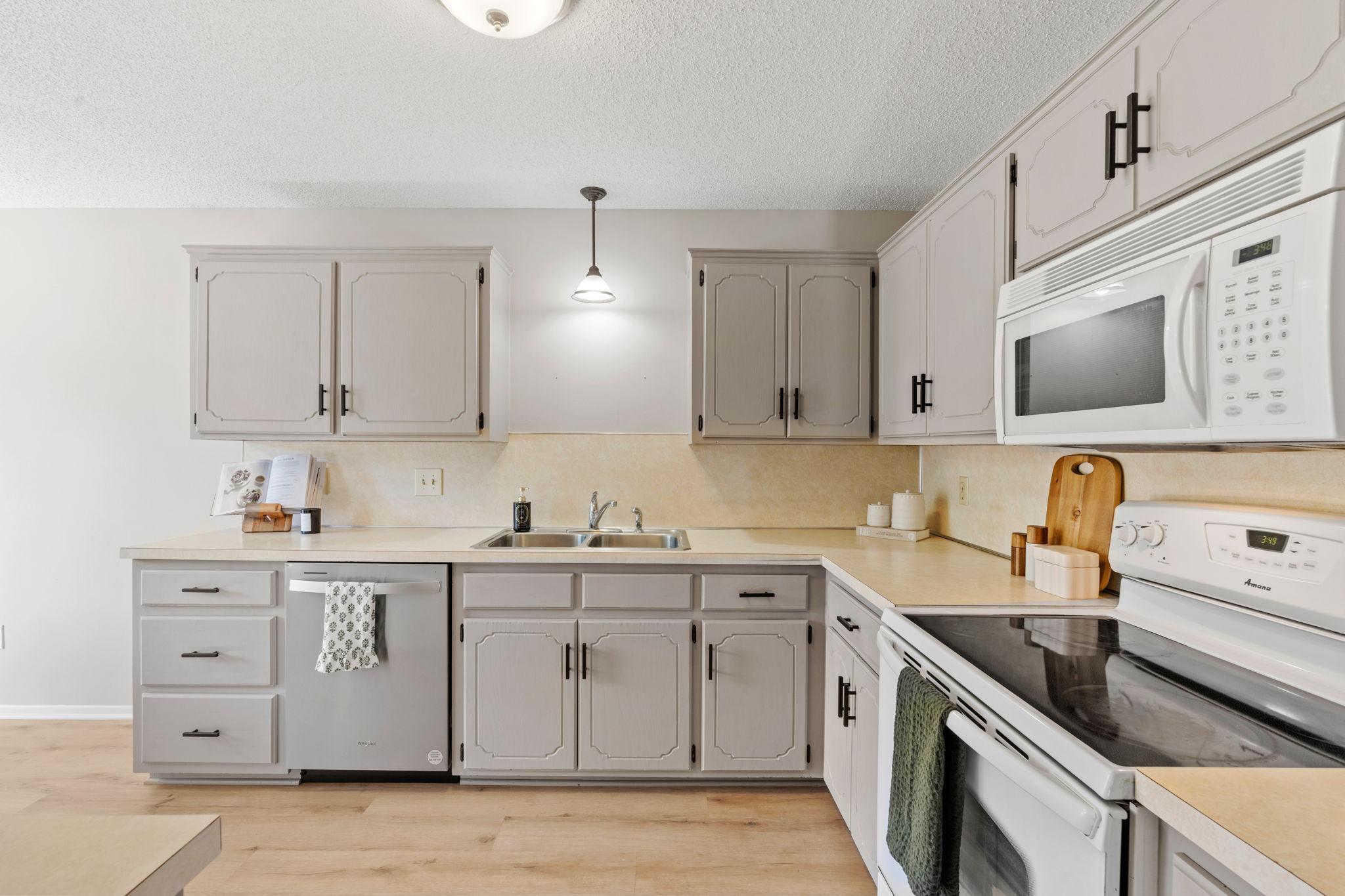 Kitchen featuring ample workspace and a functional layout.