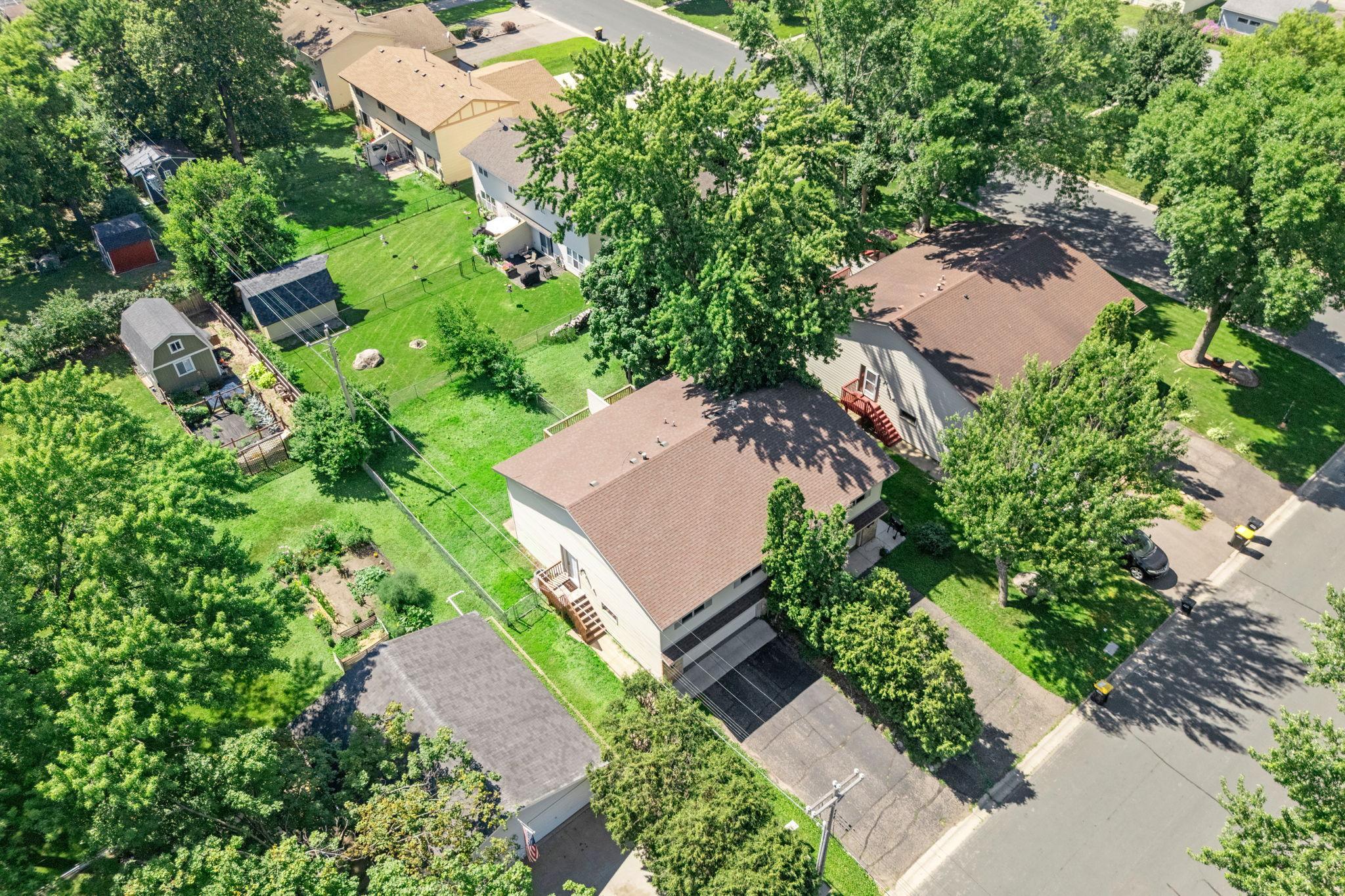 Overhead view of the home and backyard.