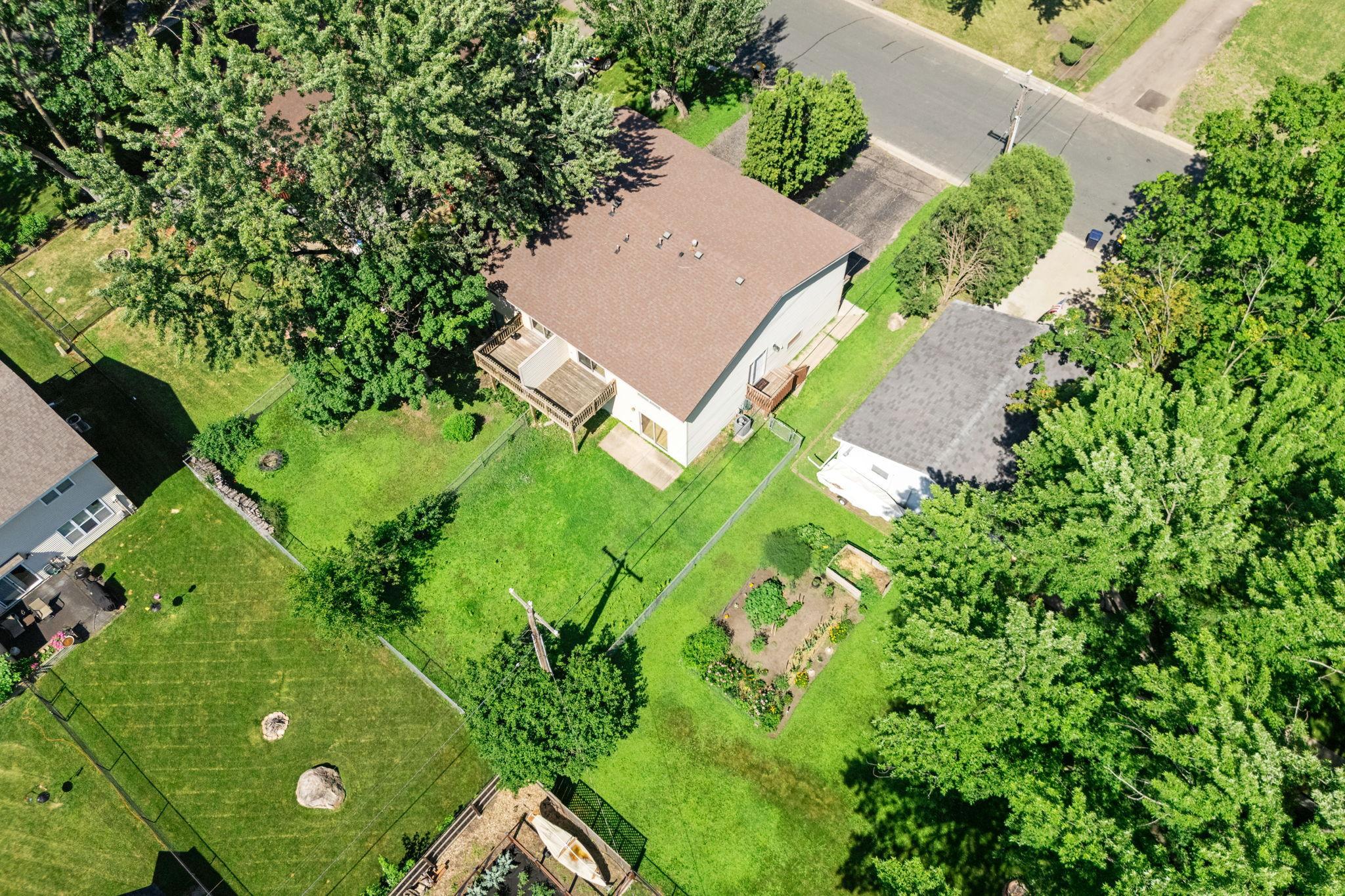 Aerial view showing the home's lot and surroundings.