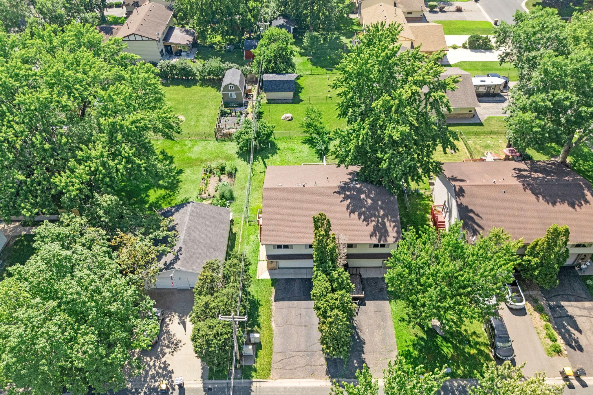 Aerial view of the property and surrounding area.