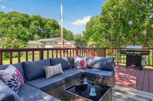 Comfortable seating areas make this deck an ideal spot to unwind and enjoy the peaceful surroundings.