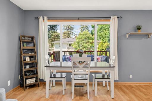 This welcoming dining area offers a comfortable setting for meals, conversation, and entertaining.