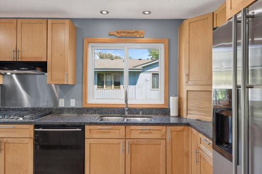 Enjoy neighborhood views while working at the sink, with plenty of natural light streaming in.