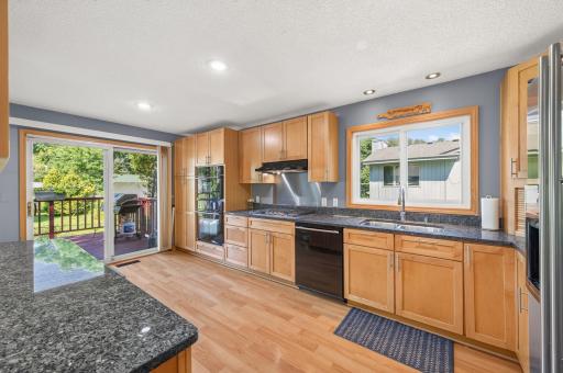 Cooking is a pleasure with a gas cooktop, wall oven, and lots of counter space.