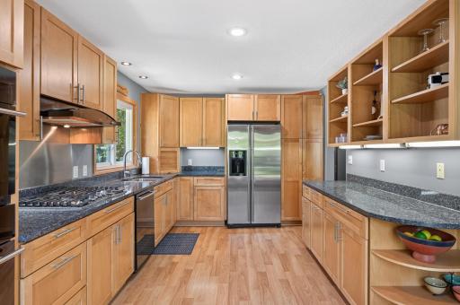 Designed with functionality in mind, this kitchen provides generous storage and workspace.