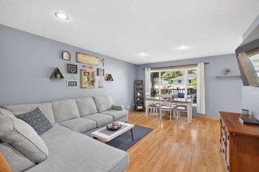 Large windows bring the outdoors in and fill the space with sunshine.