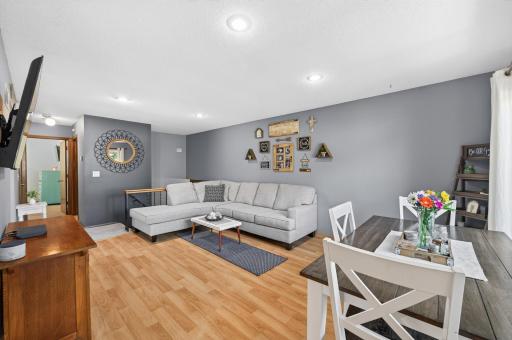 The comfortable living room is filled with natural light and offers plenty of room to relax.