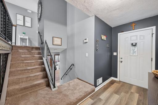 The split-entry design offers a spacious entrance and convenient access to both levels.