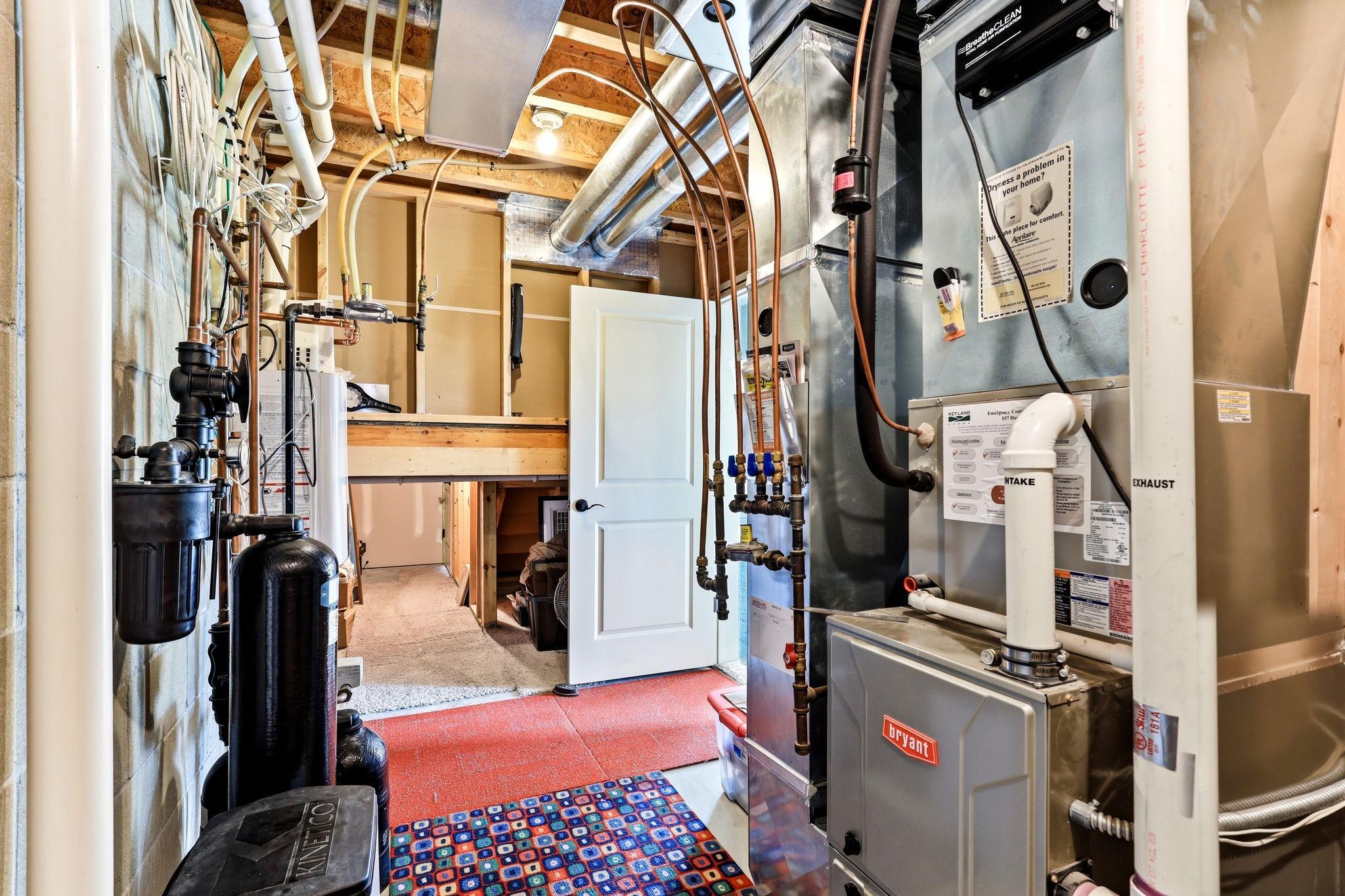 Upgraded furnace featuring integrated UV light system for enhanced indoor air quality and allergen control.