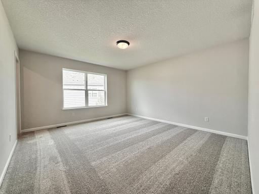 Spacious owners suite full of natural light