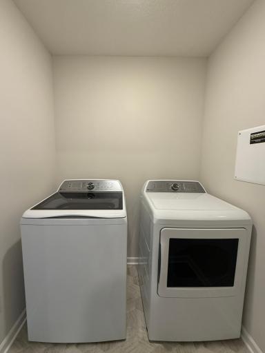 Included washer and dryer provide a turnkey experience, with ample room to add shelving or cabinets