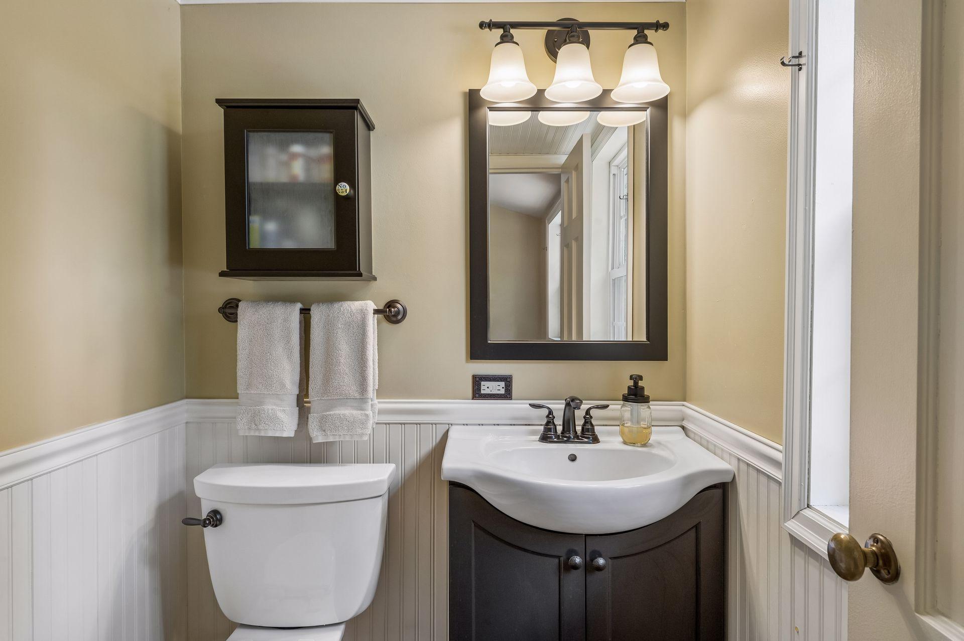 Upper level half bathroom
